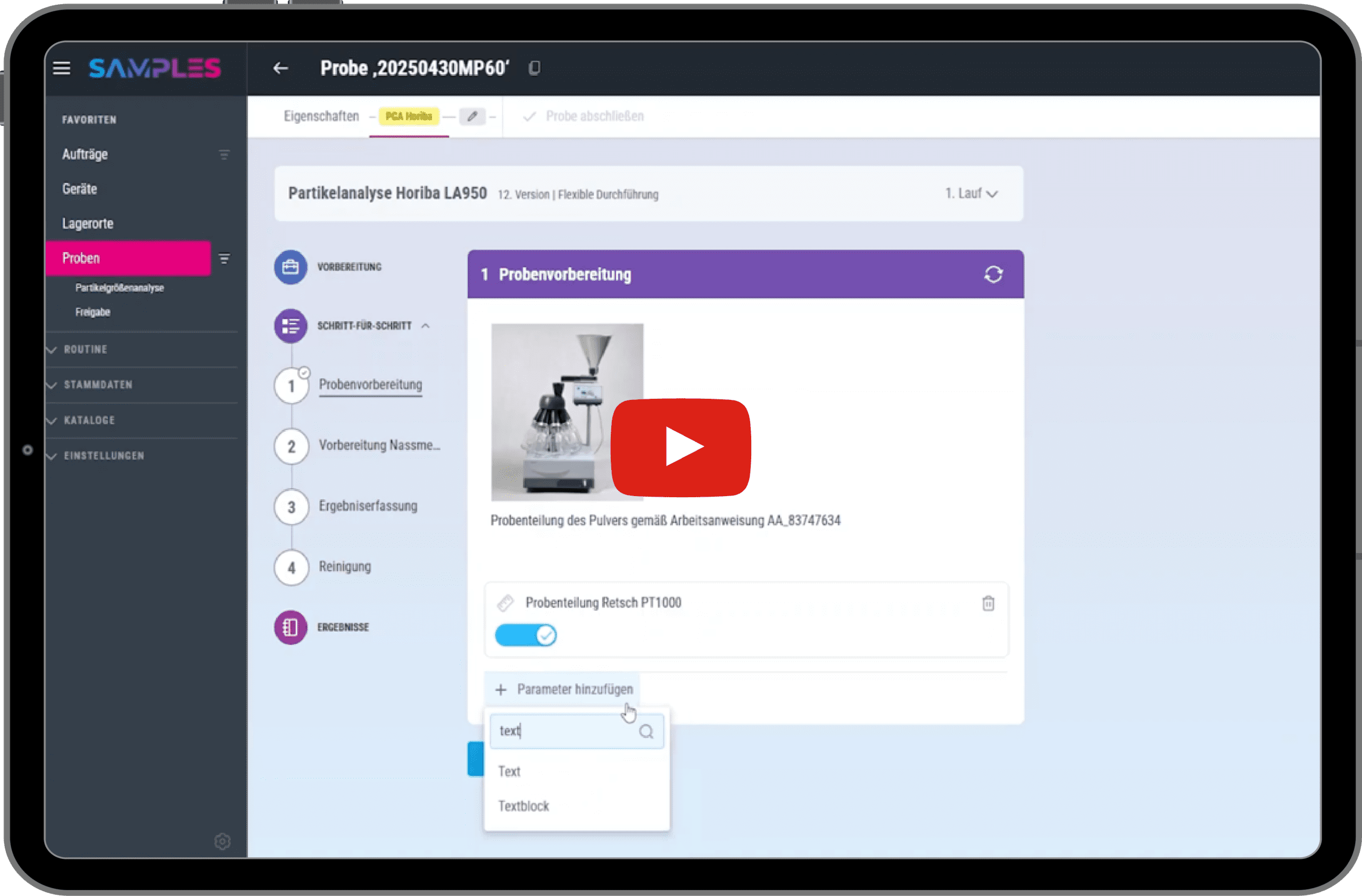 Tablet with a video sequence of the application from the live demo with a YouTube play button in the foreground